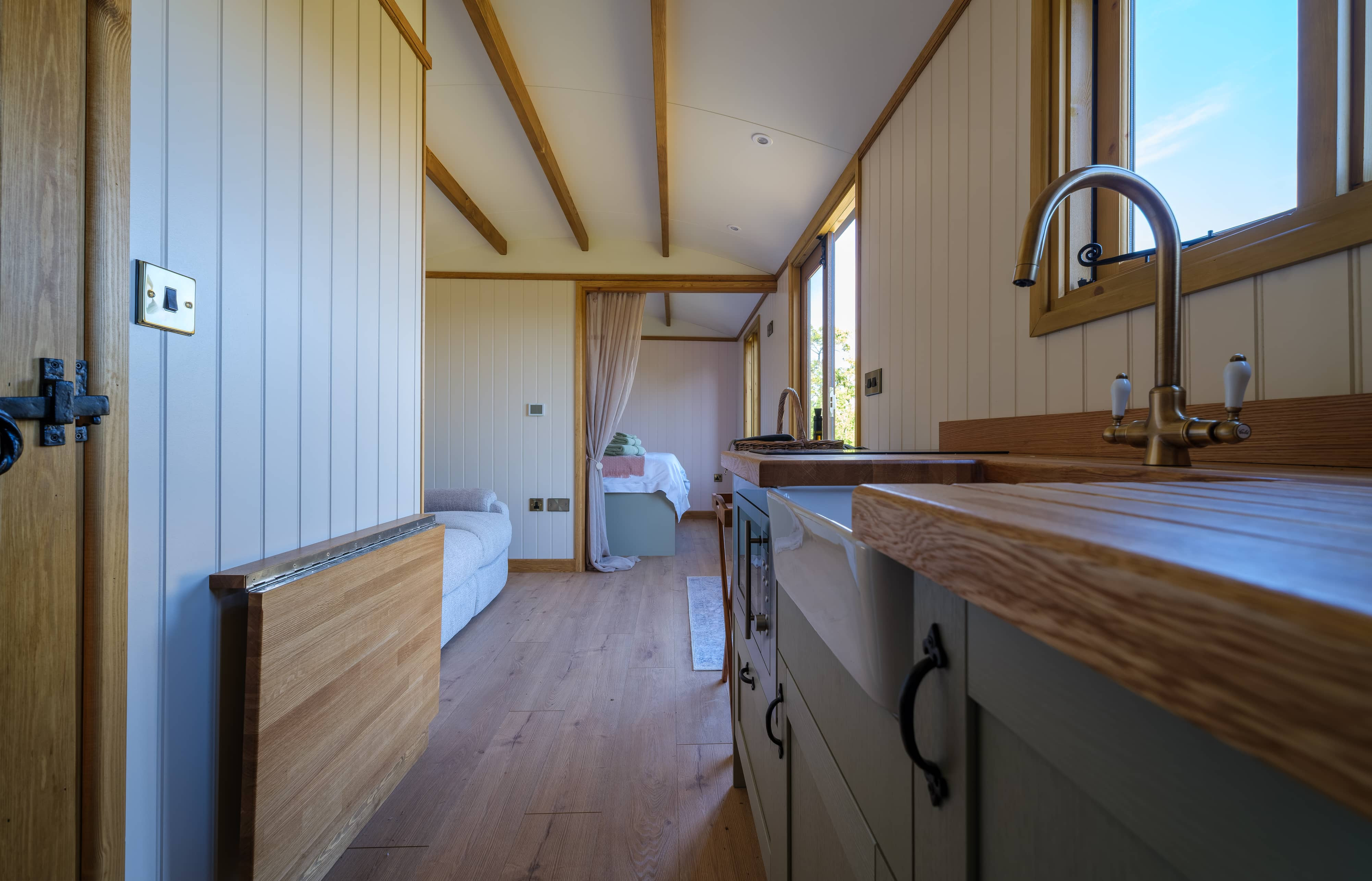 Looking down the corridor showing the kitchen and bathroom door